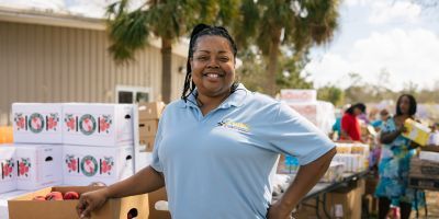 Photo of a food bank worker at a food distribution location