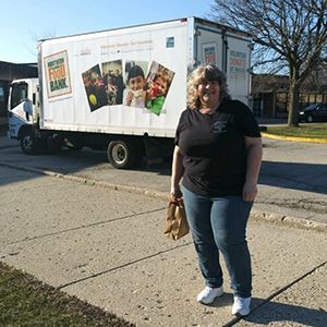 Tammy volunteering outside of Northern Illinois Food Bank