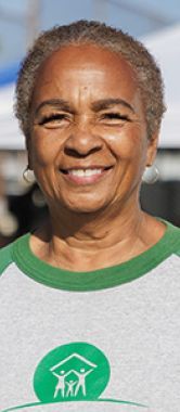 A woman smiling at the camera.