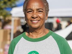 A woman smiling at the camera.