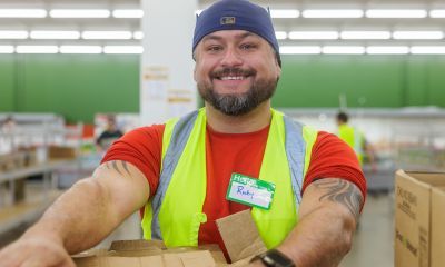 Ricky holding a box.
