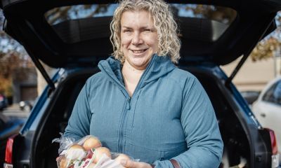 Kathryn holding food.