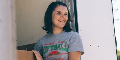 Pantry volunteer taking boxes off of truck