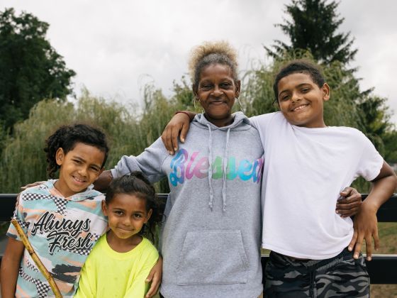 A grandmother and her grandchildren.
