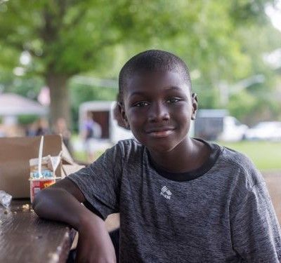 Monte, 8, eats summer meals at the Ken Rock Community Center in Rockford, Illinois.