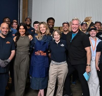 A group of volunteers from Disney smiling