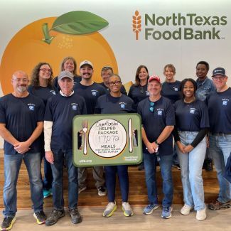 Volunteers from Crum & Forster posing for a group photo.