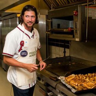 Jason Grilli serves up some grilled cheese to kids in need