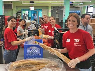 TJX employees volunteering at food bank