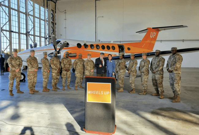 The Wheels Up team welcomes the orange plane in honor of hunger awareness into their fleet during Hunger Action Month 2020