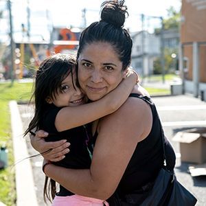 Paola and her daughter at a mobile pantry in New York