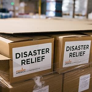 A stack of boxes labeled "disaster relief."