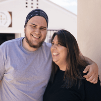 Sally and her son, Robert, share an embrace. 