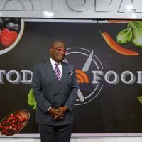 Al Roker in front of Today Show sign