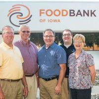 Land O' Lakes and Food Bank of Iowa staff outside the food bank.