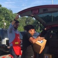 Feeding America employee Jordan Vernoy volunteering. 